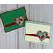 A card making kit with cream and green cherry embossed cardstock, with red ribbons and cherry fabric and burlap heart embellishments.
