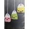 "Handcrafted crochet teabag bookmark with a delicate string and tag"