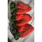 Medium dark orange crochet carrot pouches with dark green top Pouches measure around 5 inches wide at the top and 6 inches long. 