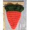 Crocheted carrot treat pouch shown with rulers to show size while empty. 5inches on top and tapers to a point. 6inches long.