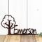 Close up of metal child name plaque with cute tree silhouette, in copper vein powder coat.
