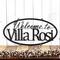 Hanging oval Welcome house name metal sign, in matte black powder coat.