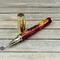 red and gold resin pen