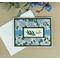 A flower card making kit with green cardstock, hydrangea scrapbook paper. stamped "hello" sentiments, light blue ribbons and cards/envelopes