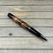 Gunmetal twist pen with plum wood