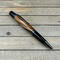 Black and gunmetal wood pen