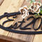Close up of matte black powder coat on our oval established year metal wall art.