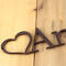 Close up of copper vein powder coat on our child name metal sign.