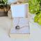 Leopard Glass Copper Fidget Necklace in packaging