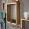 A closeup side-angle of a modern square shelf, handcrafted wood in a natural color. A stylish way to display a collection of 3-D Dragons.