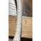 White braided rope measured against a wooden ruler showing 2–3 inches. The rope's diameter is slightly over 0.5 inches.