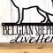 Close up of Belgian Shepherds Live Here metal wall decor, in matte black powder coat.