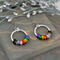 Progress pride chainmaille hoop earrings with 22 tiny links; two links in each of the 11 colors of the rainbow progress pride flag