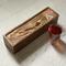 Warm burnt Sienna and gold design on this tea box.  Glpssy resin finish.