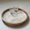 Wooden serving tray styled with crystal glasses.  Handles are cut out of the wood rim of the tray making it easy to carry.