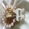 E28
Light pale pink beads and silver beads with butterfly charm on the bracelet and Rhinestone studs on the earrings