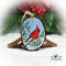 A hand-painted northern cardinal wood slice Christmas ornament available for purchase exclusively at Cove Creek Photography.