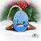 A hand-painted wood slice Christmas ornament with a mallard on water. The ornament may be purchased at Cove Creek Photography.