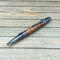 Antique pewter pen with copper accents