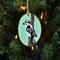 A hand-painted downy woodpecker wood slice ornament available at Cove Creek Photography.
