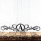 Metal monogram sign with vines, in matte black powder coat.