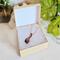 Copper Wire Wrapped Sapphire Necklace in packaging