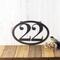 Horizontal oval 2 digit metal house number sign, in silver vein powder coat.