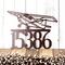 5 digit metal house number sign with airplane, in copper vein powder coat.