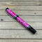 Pink rollerball pen with white flecks