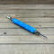 Double ended seam ripper in powder blue and white
