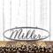 Oval family last name metal sign with script font, in silver vein powder coat.