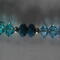 Glass bead and crystal with silver accent beads. 7 1/2 inch stretch bracelet.