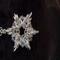 Silver plated 6-pointed elven star with pink/purple crystal beads. 24" silver plated chain.
