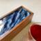 Dark blue with white and silver waves top this organizer for tea bags. Perfect gift fot the tea lover.  Great for Father's Day!