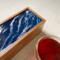 Waves design on this 5-compartment tea box is perfect for the tea and ocean lover.