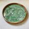Shades of green swirl together with white and gold on this 18” wooden serving tray.  A great gift.