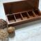 5-compartment in this wooden tea box for organizing tea bags.