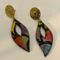 Stylish Earring Statement Jewelry. Colorful, modern leaf shaped design drop earrings with gold tone stainless steel decorative ear posts.
