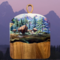 Charcuterie board with bison and Grand Teton scene, featuring layered resin art on acacia wood. One of a kind, 17x12.5 inches.