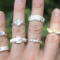 Ring listed is on the pinky finger on the bottom left.