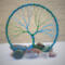 blue tree of life with green wire mixed in create a truly beautiful decoration for any small space. 