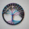 a perfect blend of coloring creates this magical tree, black, purple, blue, multicolor chips