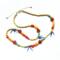 Fun, colorful, casual beaded necklace with a tropical vibe and made with eco-friendly materials. Adjustable length 24" to 28".