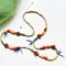 Fun, colorful, casual beaded necklace with a tropical vibe and made with eco-friendly materials. Adjustable length 24" to 28".