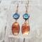 Handmade earrings with blue Czech glass flower beads and hammered copper dangles, romantic artisan jewelry, 1.5 inches long.
