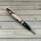 Dark gunmetal and gold praying hands ballpoint pen