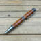 western star, horseshoe, cowboys boots on a pen