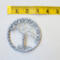measures 3inch across as shown using a tape measure