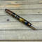 Black and gold resin cast live edge mesquite wood