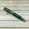 Green and gold resin cast flowers 
